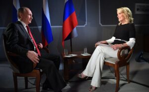 Photo of Kelly with Russian president Vladimir Putin, June 2017