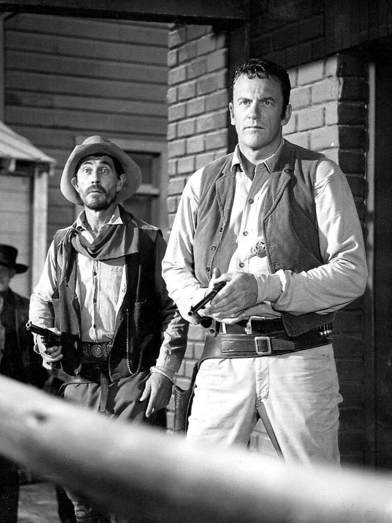 Photo of Ken Curtis as Festus Hagen and James Arness as Matt Dillon from Gunsmoke.