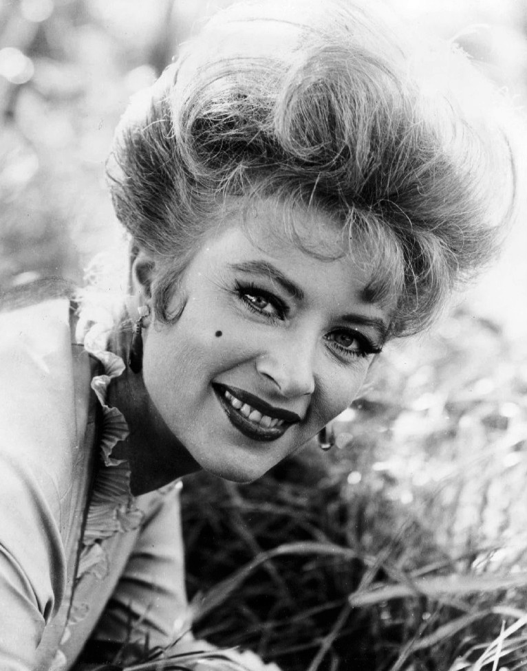 Publicity photo of Amanda Blake as Kitty Russell from the television program Gunsmoke.