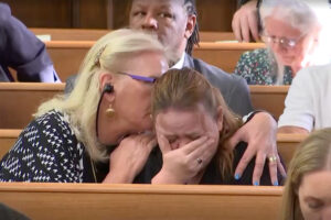 Jo-Ellan Dimitrius, seen comforting Wendy Rittenhouse, had previously worked with O.J. Simpson. Reuters