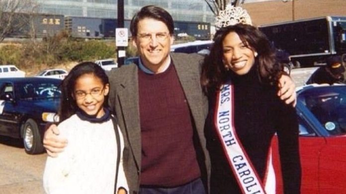 Photo of Young Cheslie Kryst with mother and stepdad