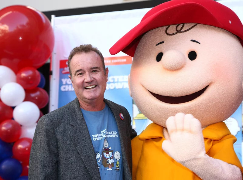 Voice actor Peter Robbins and the character he voiced, Charlie Brown, attend a DVD release party in Hollywood, Calif., in 2008.