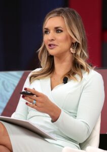Photo of Katie Pavlich speaking at the 2018 CPAC in National Harbor, Maryland.