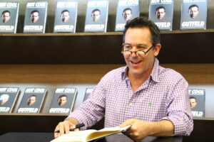 Photo of Gutfeld at a book signing for his book Not Cool (March 2014)