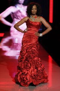 Photo of Beauvais walking the runway at 2011 The Heart Truth fashion show in New York City