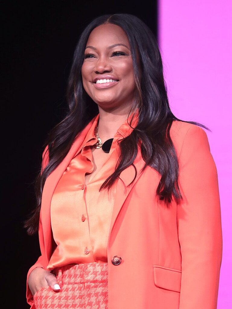 Photo of Garcelle Beauvais speaking at an event in Phoenix, Arizona.